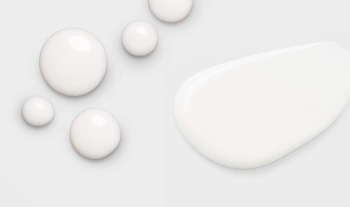 A picture of small and medium sized dots of skin care products on a white background