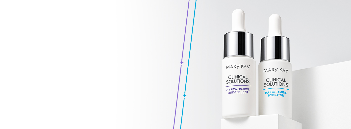 Die neuen Clinical Solutions Booster von Mary Kay bringt Ihre Hautpflegeroutine auf das nächste Level. Die zwei weißen Fläschchen stehen zusammen auf einem weißen Podest vor einem grauen Hintergrund.